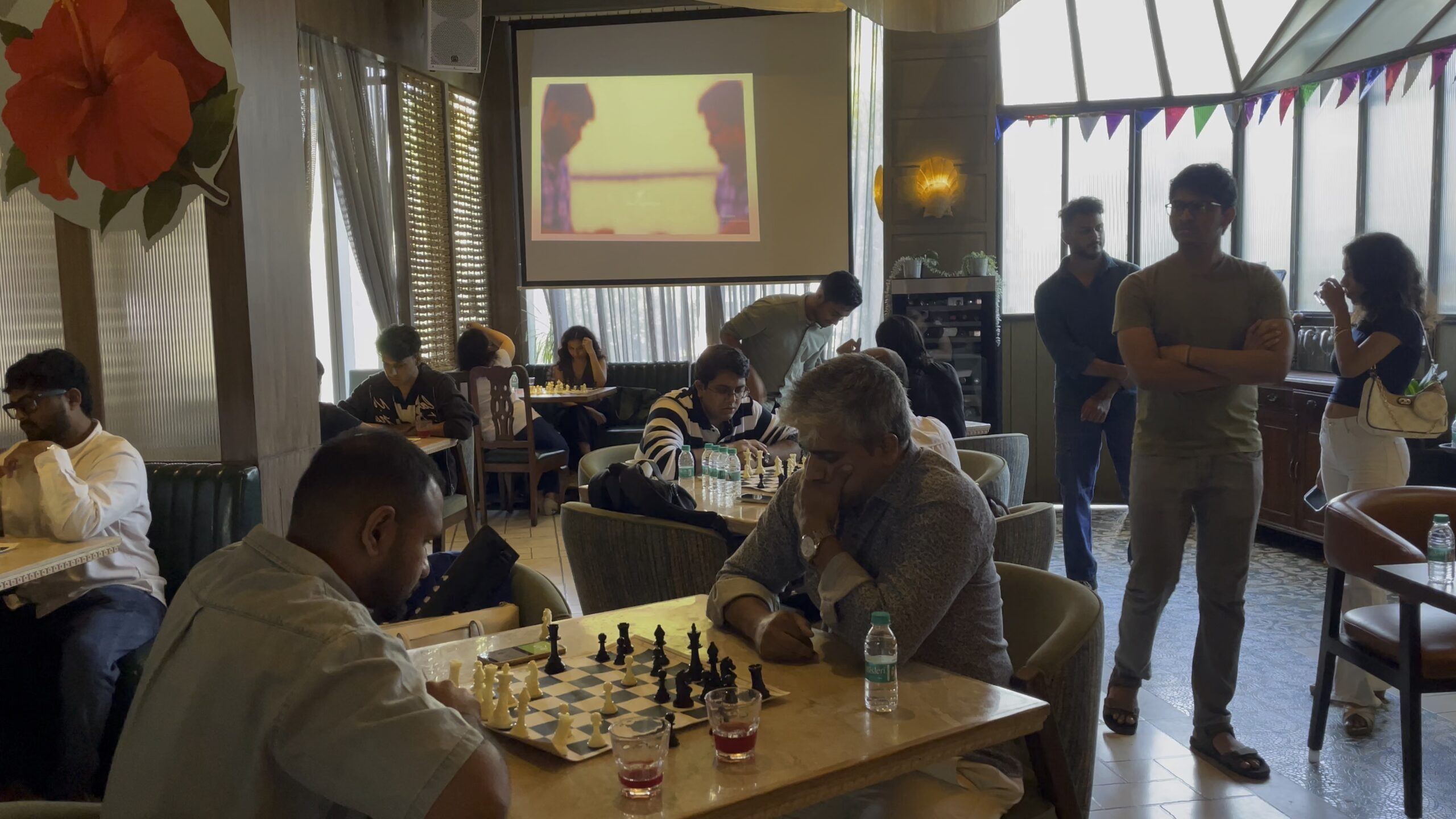 Chess Nexus attendees in conversation